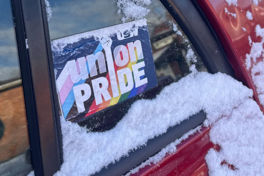 "Union Pride" sticker on a snowy car.